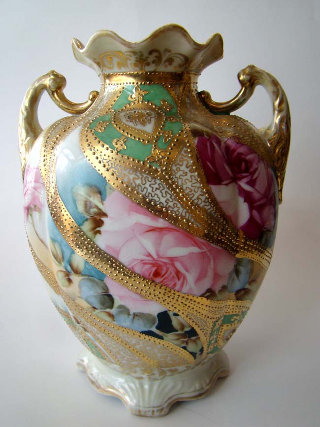 An extremely attractive two handled vase, possibly by Nippon, circa 1900
